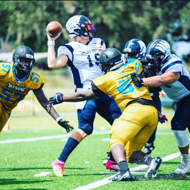 Young athletes competing in a football game